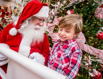 kid meeting Santa